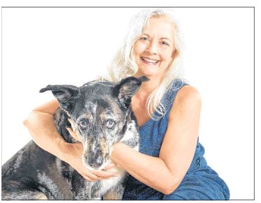 Photo of Christine Chalstorm with her rescue dog Sadie